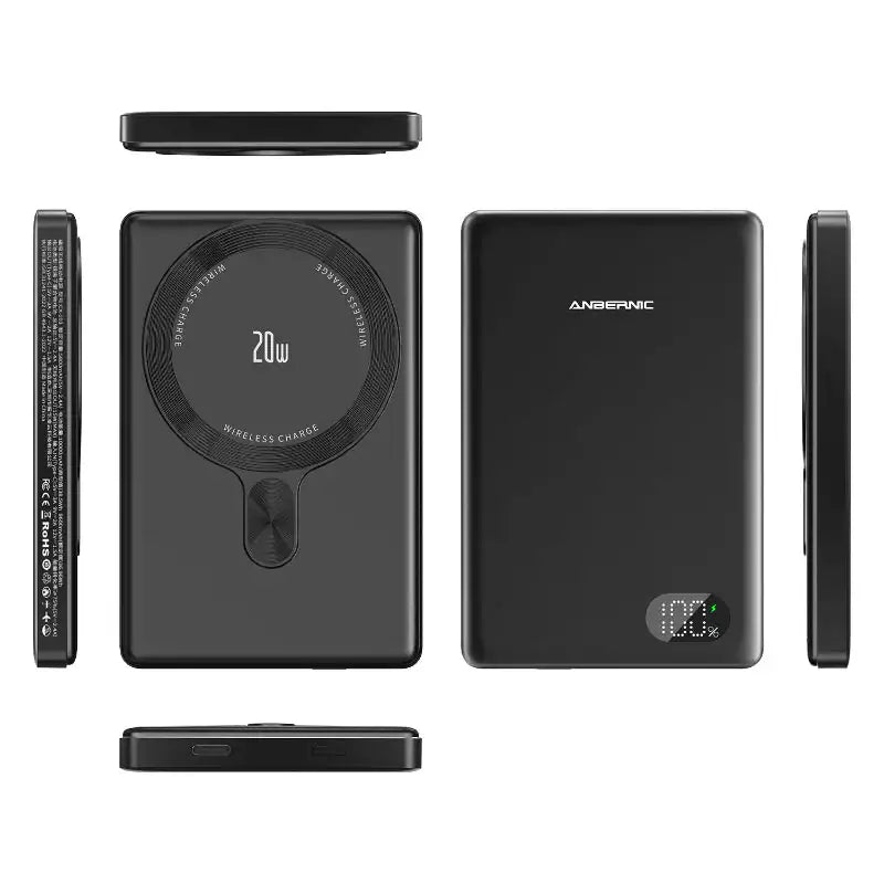 Black power bank with digital display and wireless charging pad on a white background