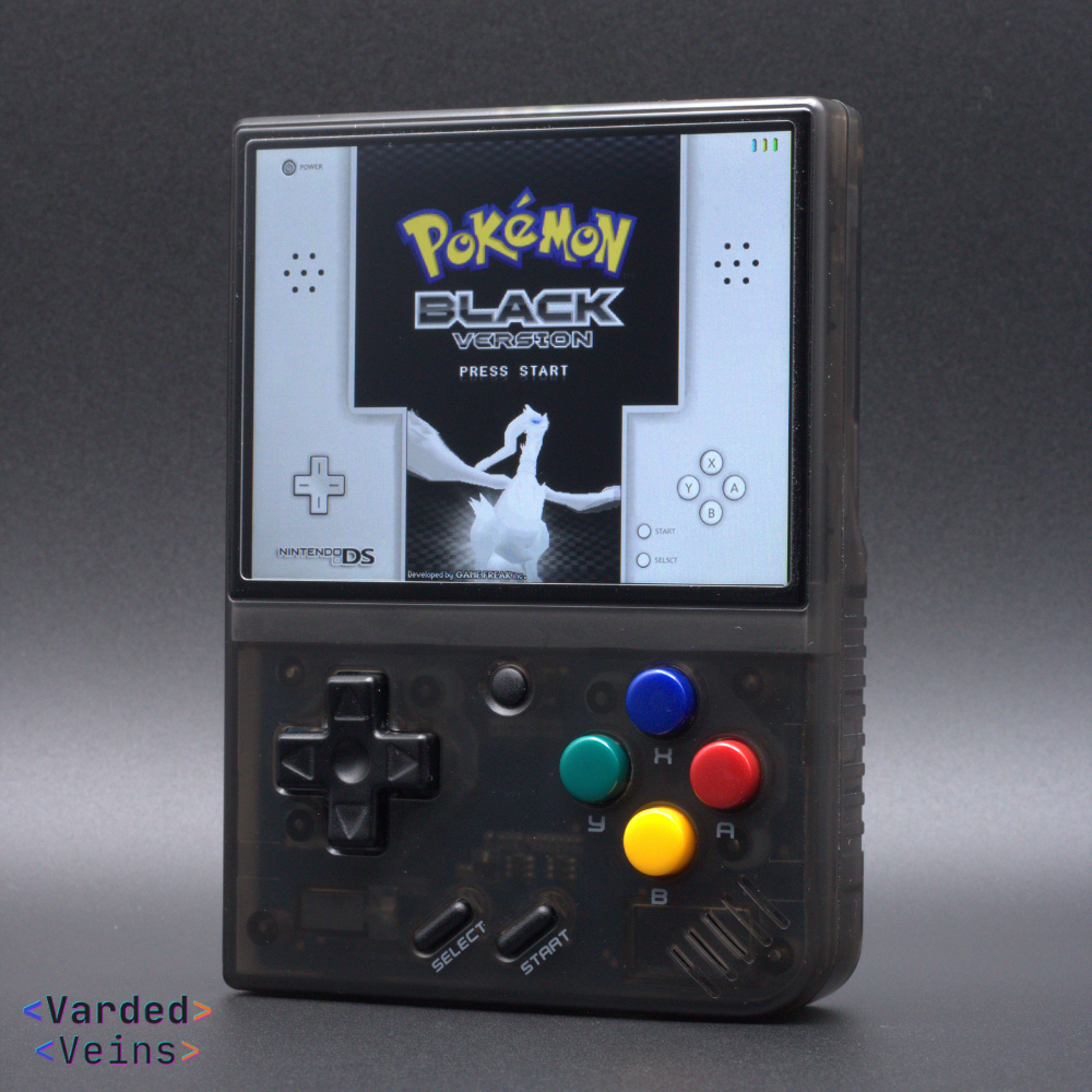 Handheld gaming console with a screen displaying 'Pokémon Black Version' on a gray background.