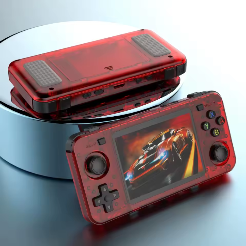 Red handheld gaming console with transparent casing on a reflective surface