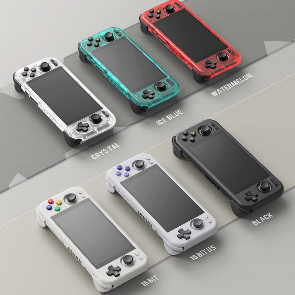 Collection of handheld gaming consoles in different colors on a gray background