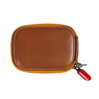 Brown leather pouch with orange trim and a red tag on a white background