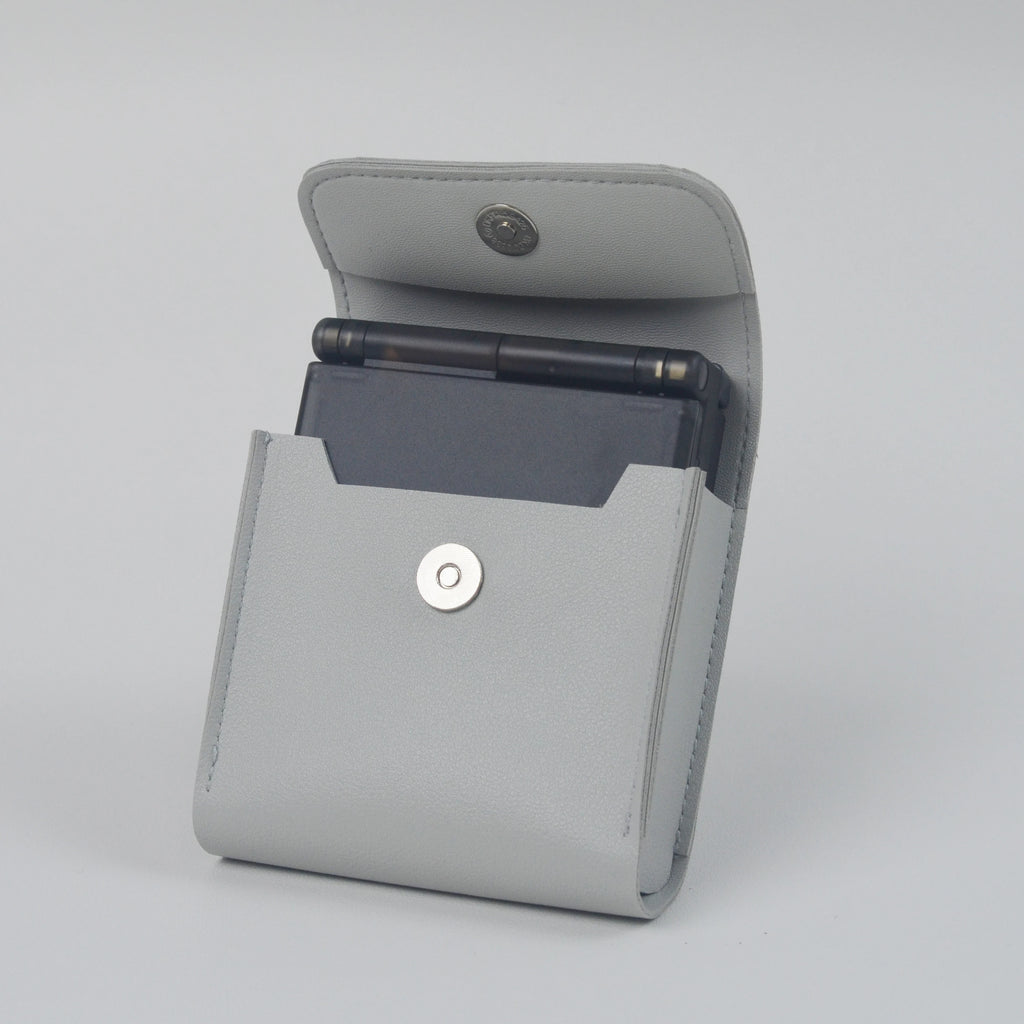 Gray case with a pocket for a smartphone on a light gray background