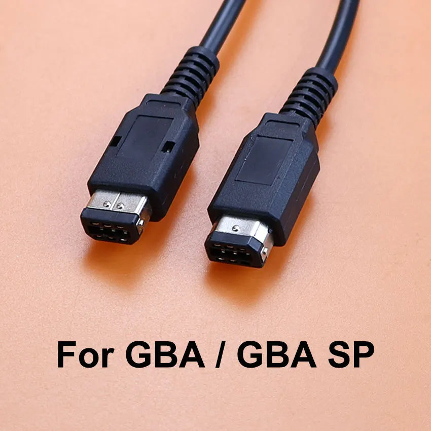 Two black cables with connectors on a beige background, labeled for GBA/GBA SP.