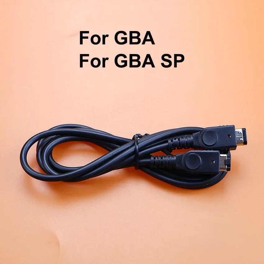 Black cable for GBA and GBA SP on a peach background