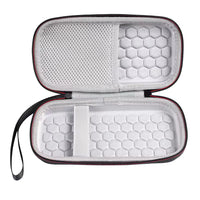 Open hard-shell carrying case with honeycomb interior on a white background